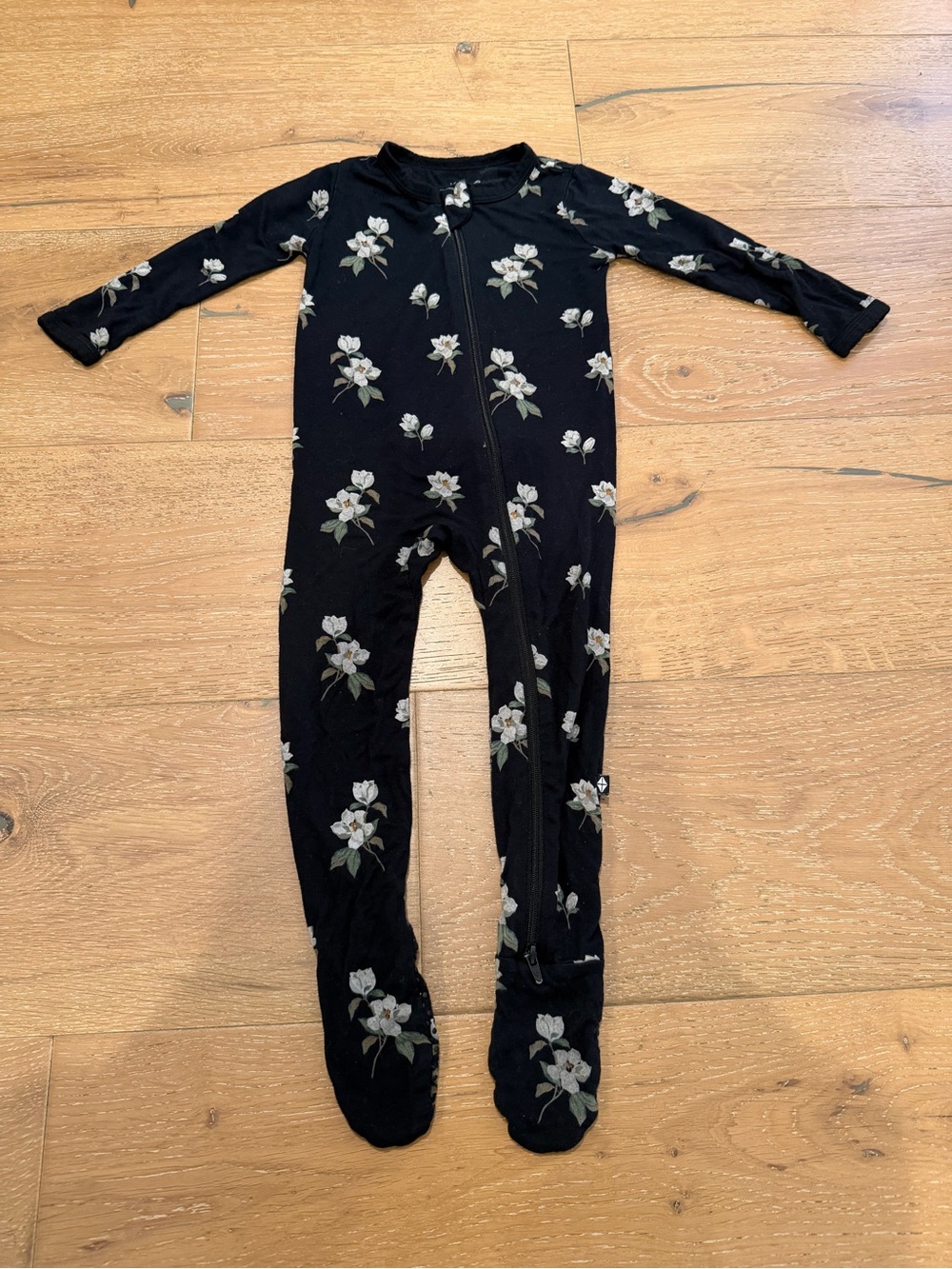Kyte BABY Black Floral Zip Footed One-Piece